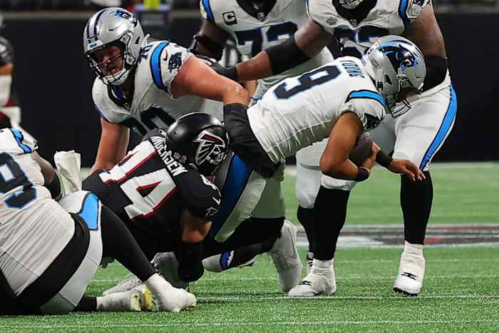 Falcons linebacker Troy Andersen sacks Carolina Panthers quarterback Bryce Young in Week 1, 2023.